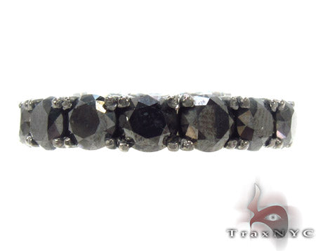 Black eternity band with round black diamonds in a continuous men's ring design