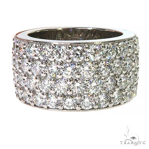 Wide white gold men's ring with multiple rows of sparkling diamonds