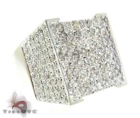 White gold men’s ring with broad rectangular face paved with multiple diamonds