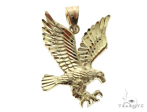 10K yellow gold eagle pendant, front view showing sculpted feather and wing detail