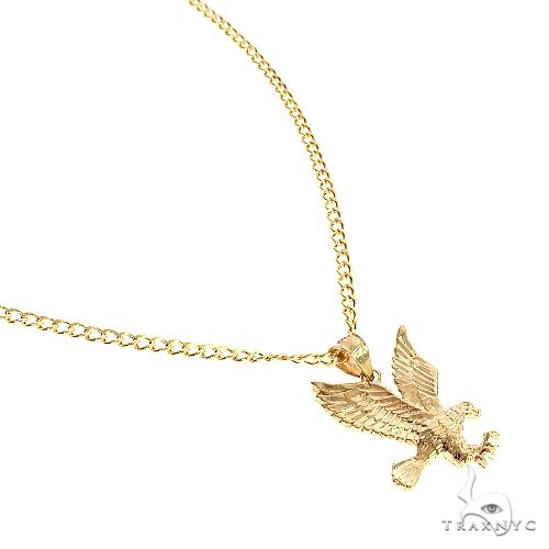 10K yellow gold eagle pendant with detailed feathers on a matching gold chain
