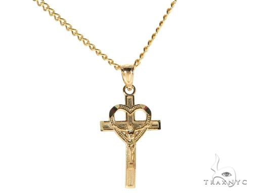 10K yellow gold heart crucifix pendant on a 24-inch Cuban link chain necklace