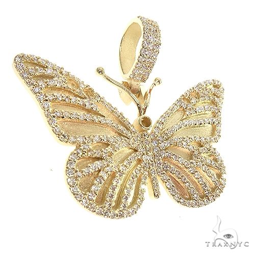 14K yellow gold butterfly pendant with intricate diamond accents and a diamond-studded bail