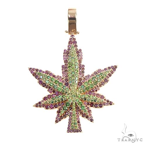 Custom 14k gold weed pendant with diamond detailing — front view showing leaf silhouette and stone placement