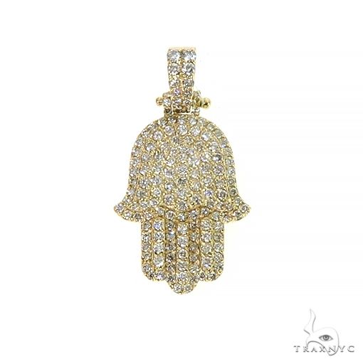 14K gold hamsa pendant with round-cut diamond accents, front view on white background