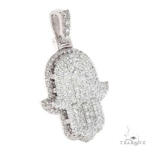 14K white gold Hamsa pendant covered in sparkling small diamonds with diamond-studded bail
