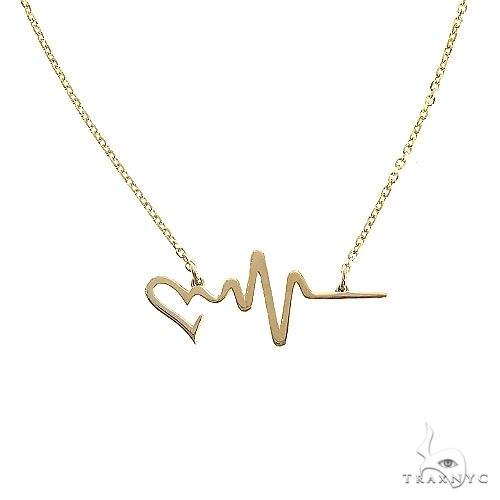 14K gold heartbeat pendant necklace – front view showing peak-and-valley profile, 1.25 inches wide