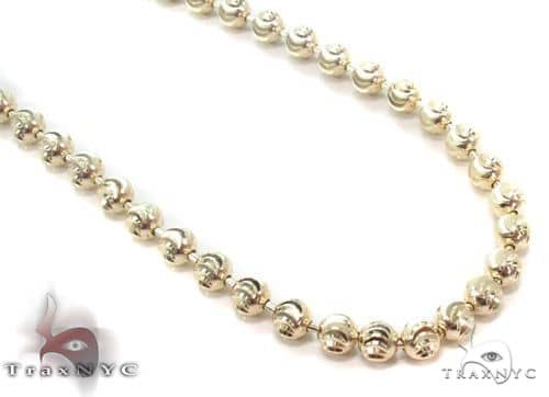 14K yellow gold moon cut chain 5mm — faceted link detail, flat lay close-up