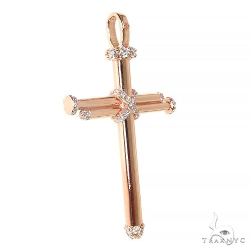 14K rose gold cross pendant designed like nails with diamond accents