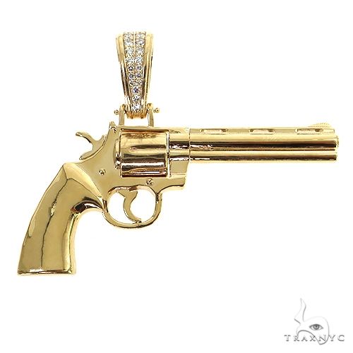 14K yellow gold revolver pendant with diamond-studded loop and rotating cylinder design