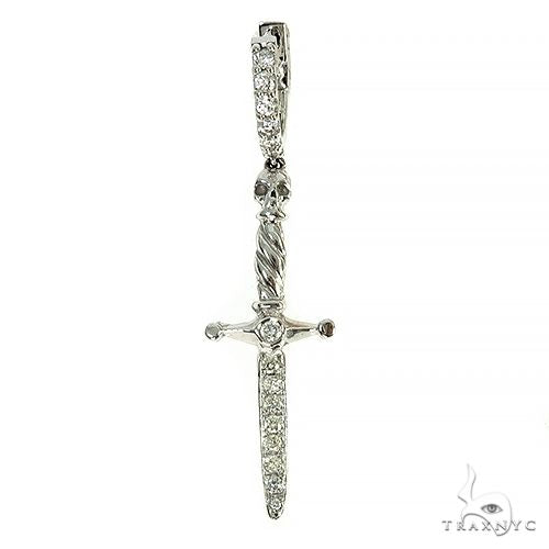 14K white gold sword-shaped earring with detailed skull and textured blade design