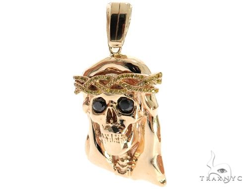 14K rose gold skull pendant with diamond crown of thorns and black stone eyes