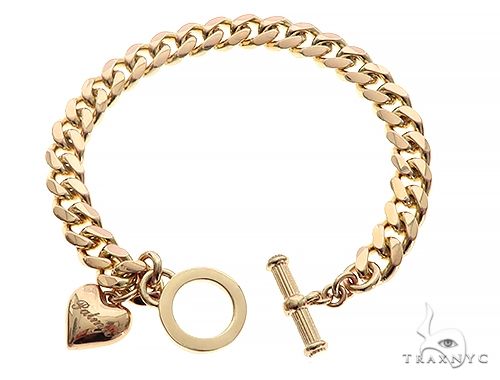 14K Yellow Gold Cuban Link Bracelet With Heart Charm And Toggle Clasp, photo 3 of 8