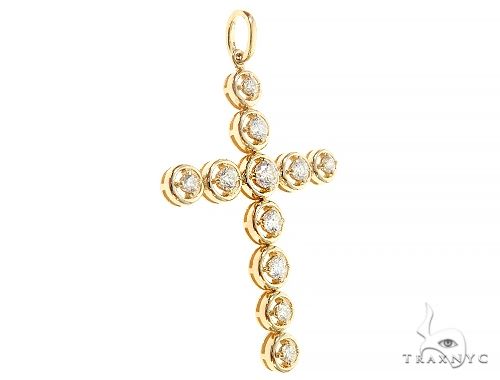 14K yellow gold cross pendant with round bezel-set diamonds and four-prong settings