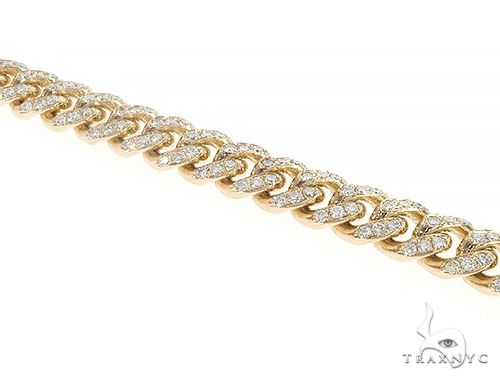 14K yellow gold Miami Cuban link bracelet with diamond accents, men's style