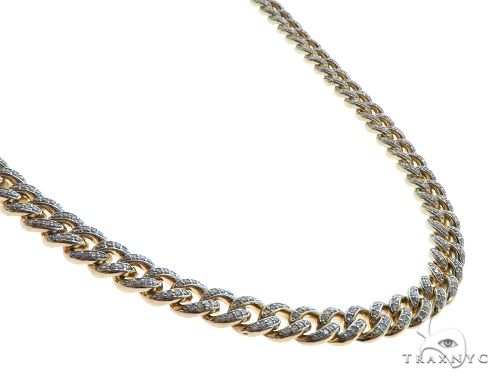 14K yellow gold Miami Cuban link chain with pave diamond accents, 7mm thickness, 28 inches long