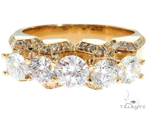14K yellow gold ring with five round brilliant diamonds and pavé accents