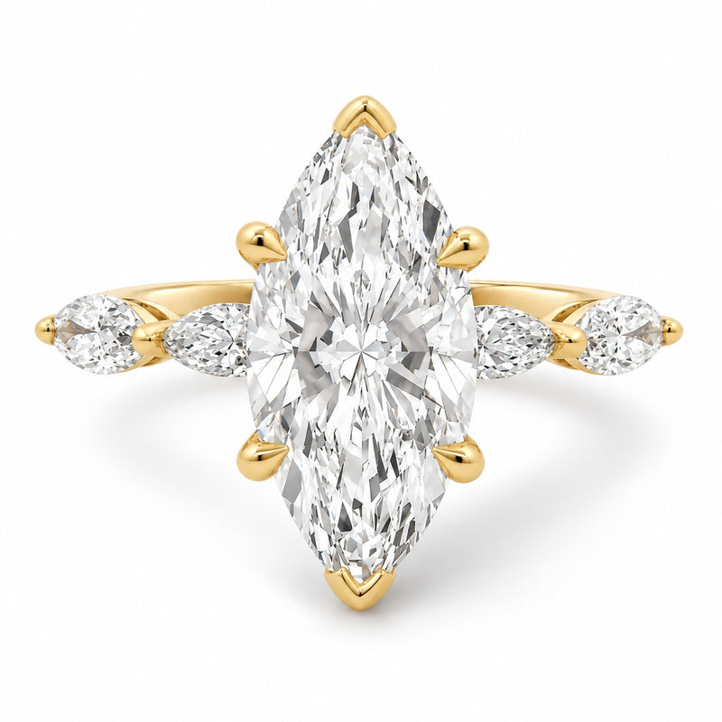 14K yellow gold marquise diamond engagement ring featuring a 2.50 carat marquise-cut lab grown center diamond, four marquise side stones, and distinctive tab and claw prongs
