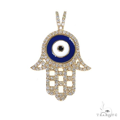 14k white gold Hamsa pendant with diamond accents and blue enamel evil eye centerpiece