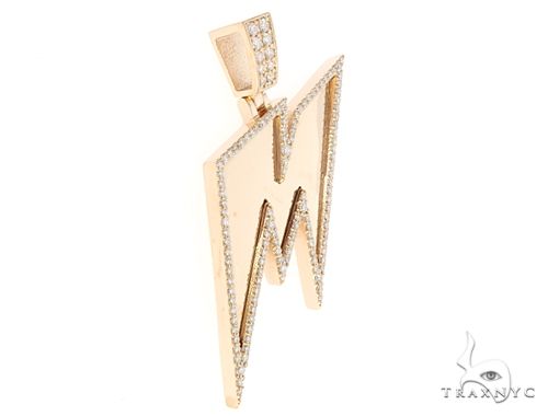 14k yellow gold 'M' pendant with diamond accents and angular lightning bolt design