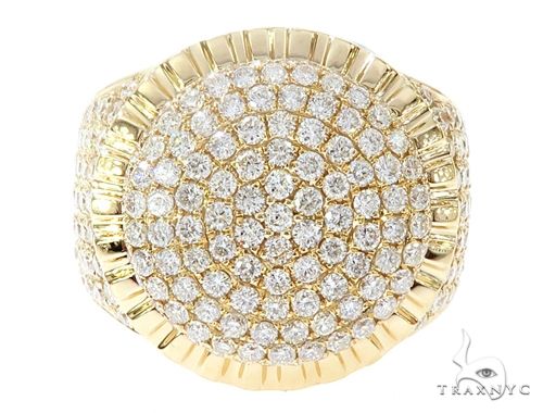 14k yellow gold men's dome ring with multiple small round diamonds in a circular pattern