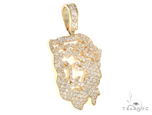 14k yellow gold Jesus pendant with pave diamond detailing and diamond-studded bail