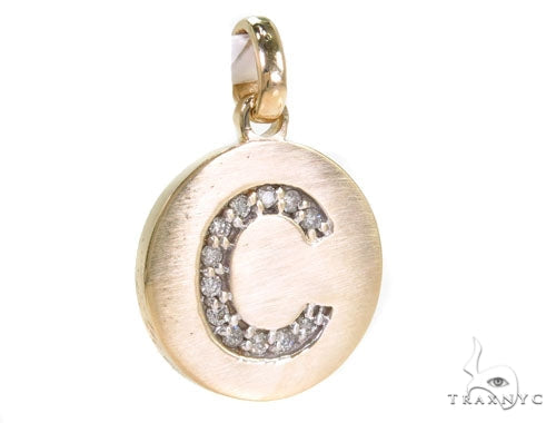14k yellow gold round pendant with diamond-studded initial C in prong setting