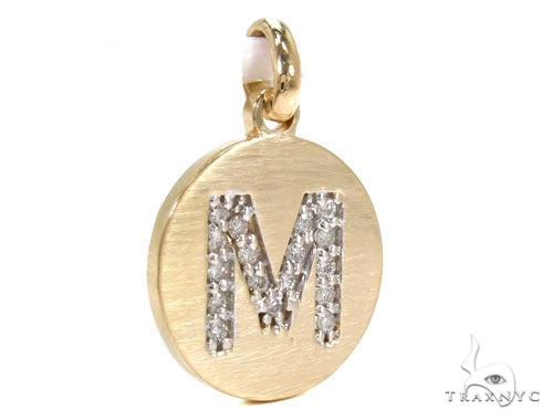 14k yellow gold round pendant with diamond-studded letter M initial