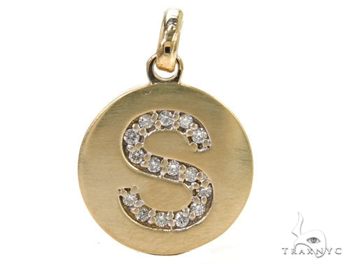 Diamond initial S pendant in 14k yellow gold – prong setting, front view
