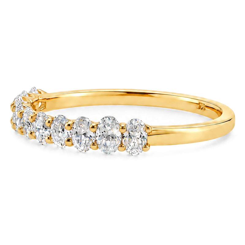 14K yellow gold petite oval lab-grown diamond wedding band, angled right view