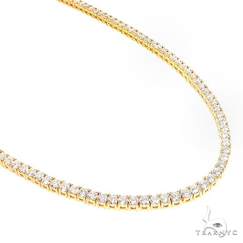 14K yellow gold diamond tennis chain with continuous round-cut stones, front view