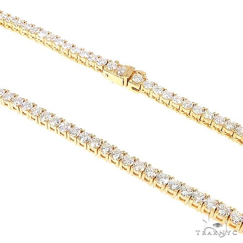14K yellow gold tennis chain with round diamonds in a classic unisex design