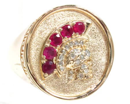 Yellow gold ring with diamond and ruby Roman warrior helmet design