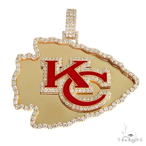 Custom 18K gold 'KC' logo pendant, front view showing raised letter design in yellow gold