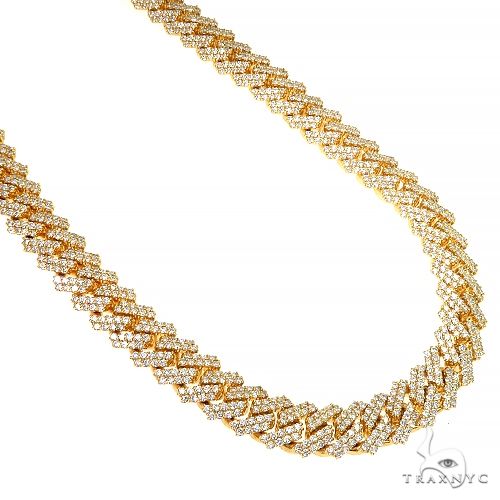 Yellow gold 2 row Cuban chain with prong-set diamonds and pavé clasp detailing