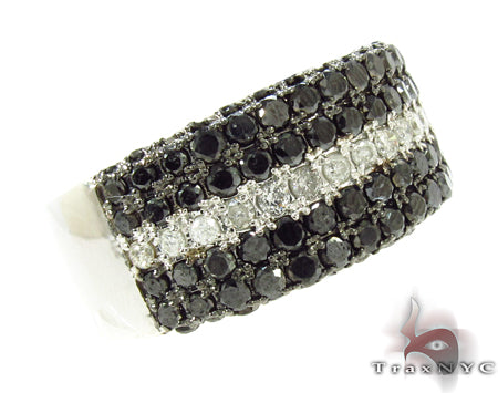Men's ring with black diamond rows surrounding a center row of white diamonds