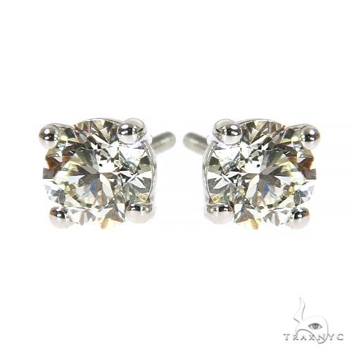 Men’s 60 pt white gold diamond stud earrings with four-prong setting