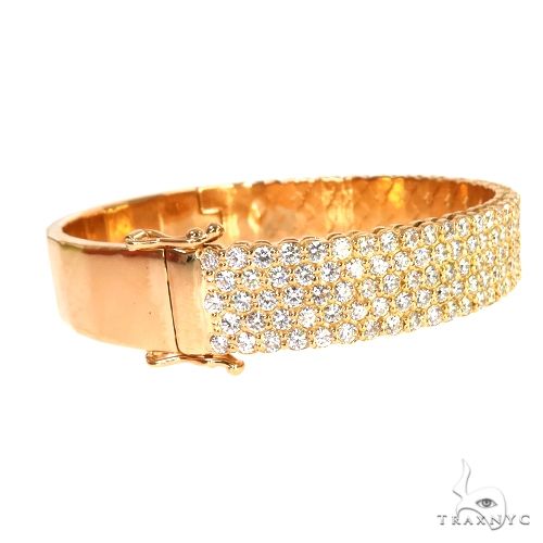 18K yellow gold bangle bracelet with five rows of sparkling diamonds, polished finish
