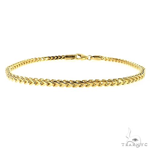 14k yellow gold solid Franco bracelet, 2.6mm width, 8 inches, flat-link profile on neutral background