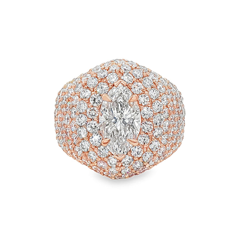 14K gold ring featuring marquise-cut center diamond