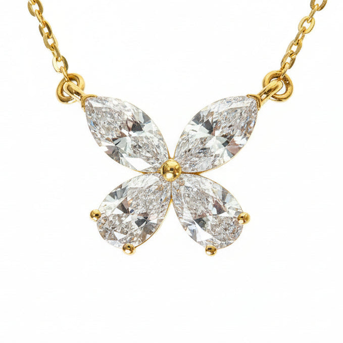 White gold butterfly necklace with four pear-shaped lab diamonds on delicate chain