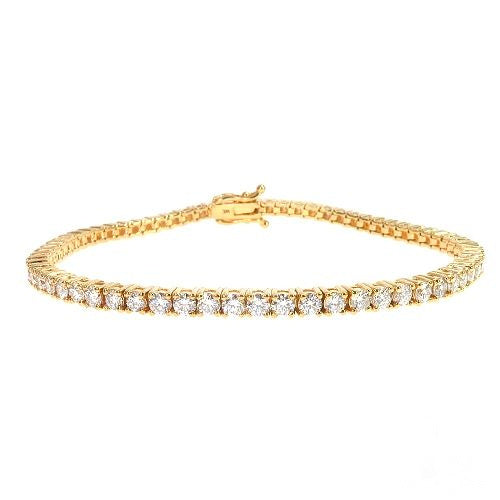 14K gold diamond tennis bracelet with continuous row of prong-set round natural diamonds, wrist angle view