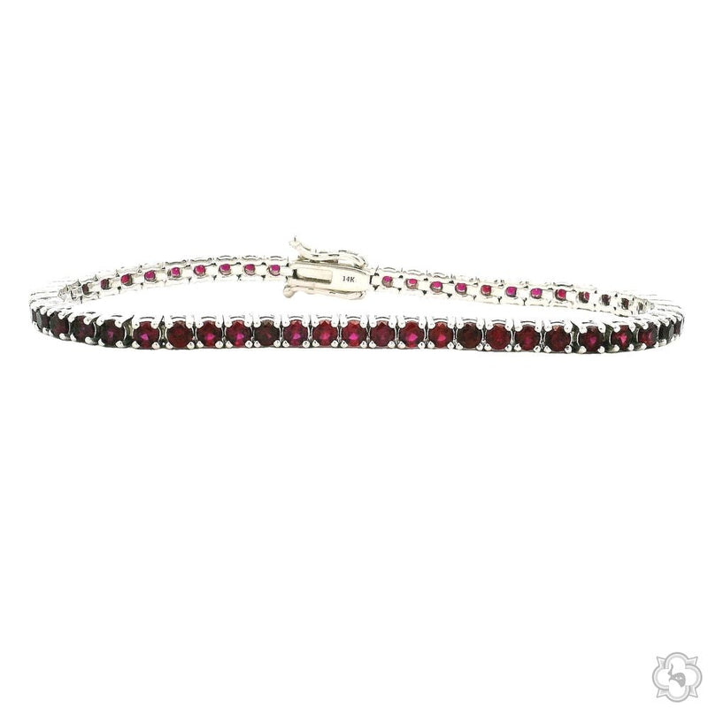 3.00mm ruby tennis bracelet in white metal setting with secure box clasp
