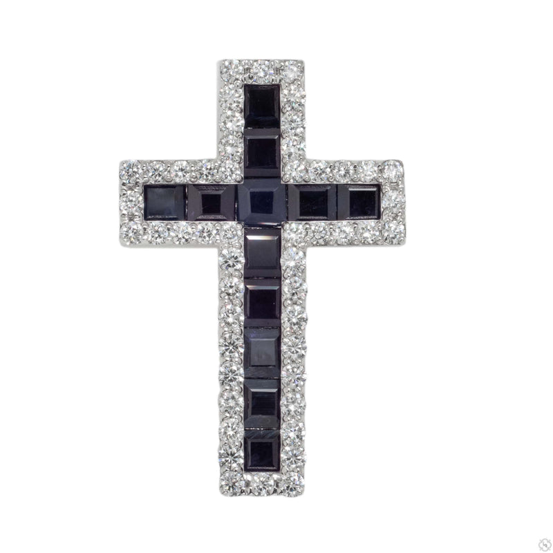Diamond cross pendant with princess-cut blue sapphires and white diamond accents, front view