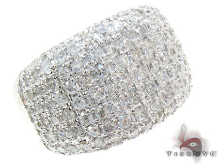 Wide white gold ring with nine rows of small sparkling diamonds in a pave setting