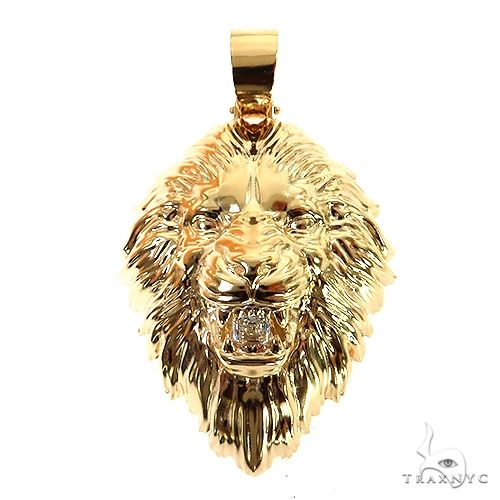 Yellow gold lion head pendant with Asscher cut diamond eyes, detailed mane design