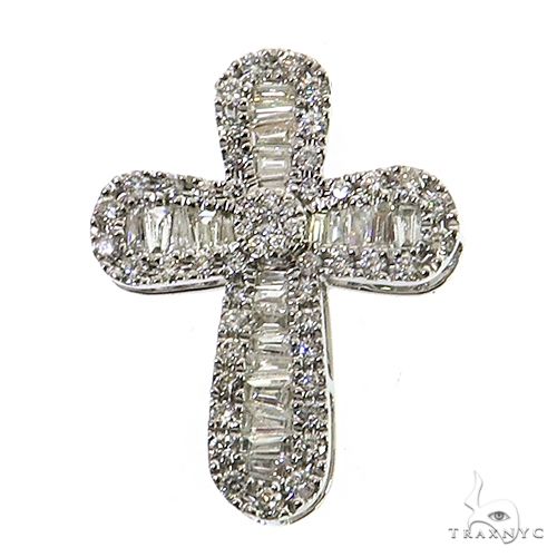 White gold baguette diamond cross pendant with sparkling round diamonds