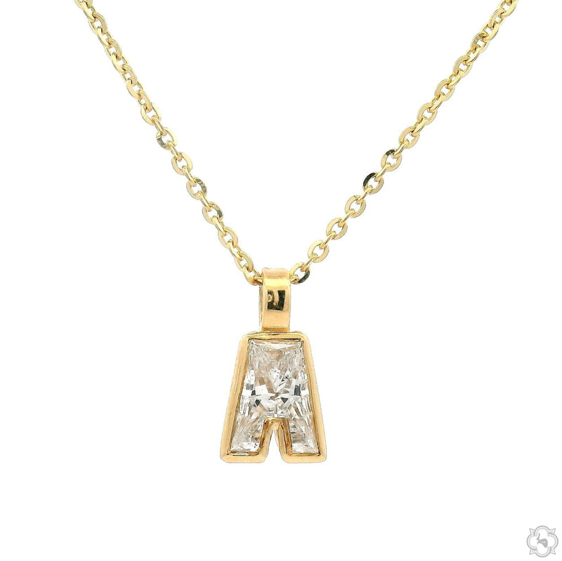 Gold bezel necklace with diamond-encrusted letter "A" pendant on delicate chain