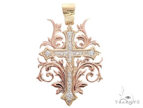 14k two-tone gold filigree cross pendant with diamond accents and intricate design