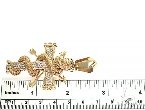Yellow gold cobra-shaped cross pendant with diamond accents and detailed scales, 2 inches long